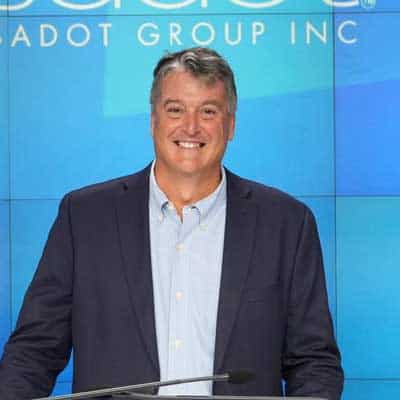 Man speaking at a podium.